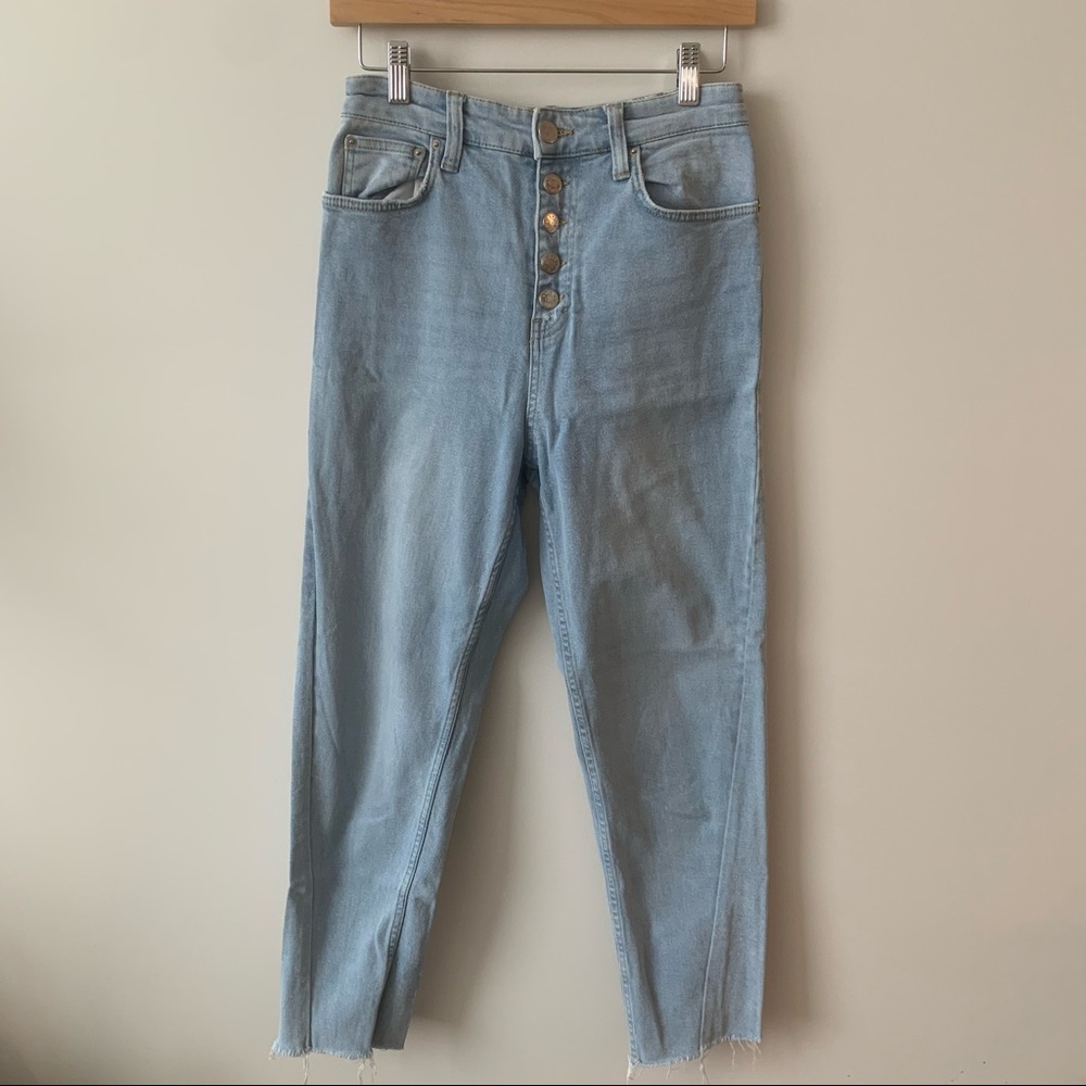 BDG girlfriend style jeans with button fly and stripe detail, light wash